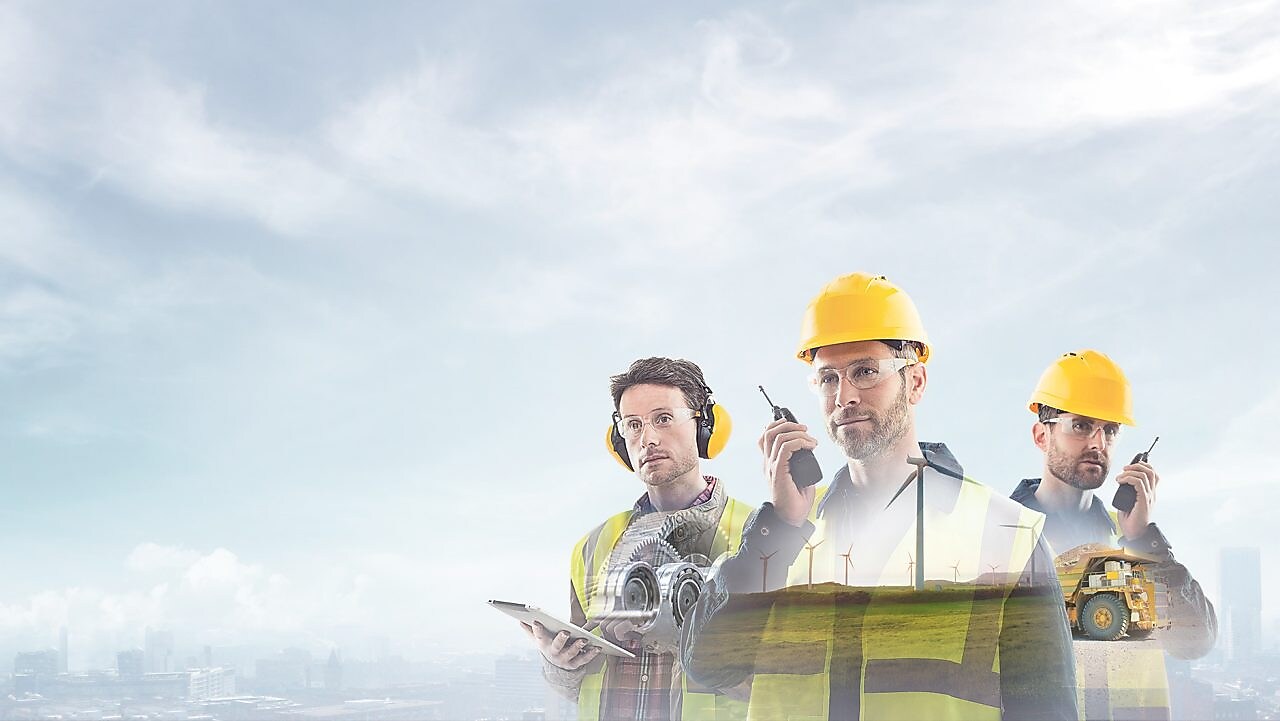  three workers on radios and reading documents, transposed over a background of blue sky with light clouds